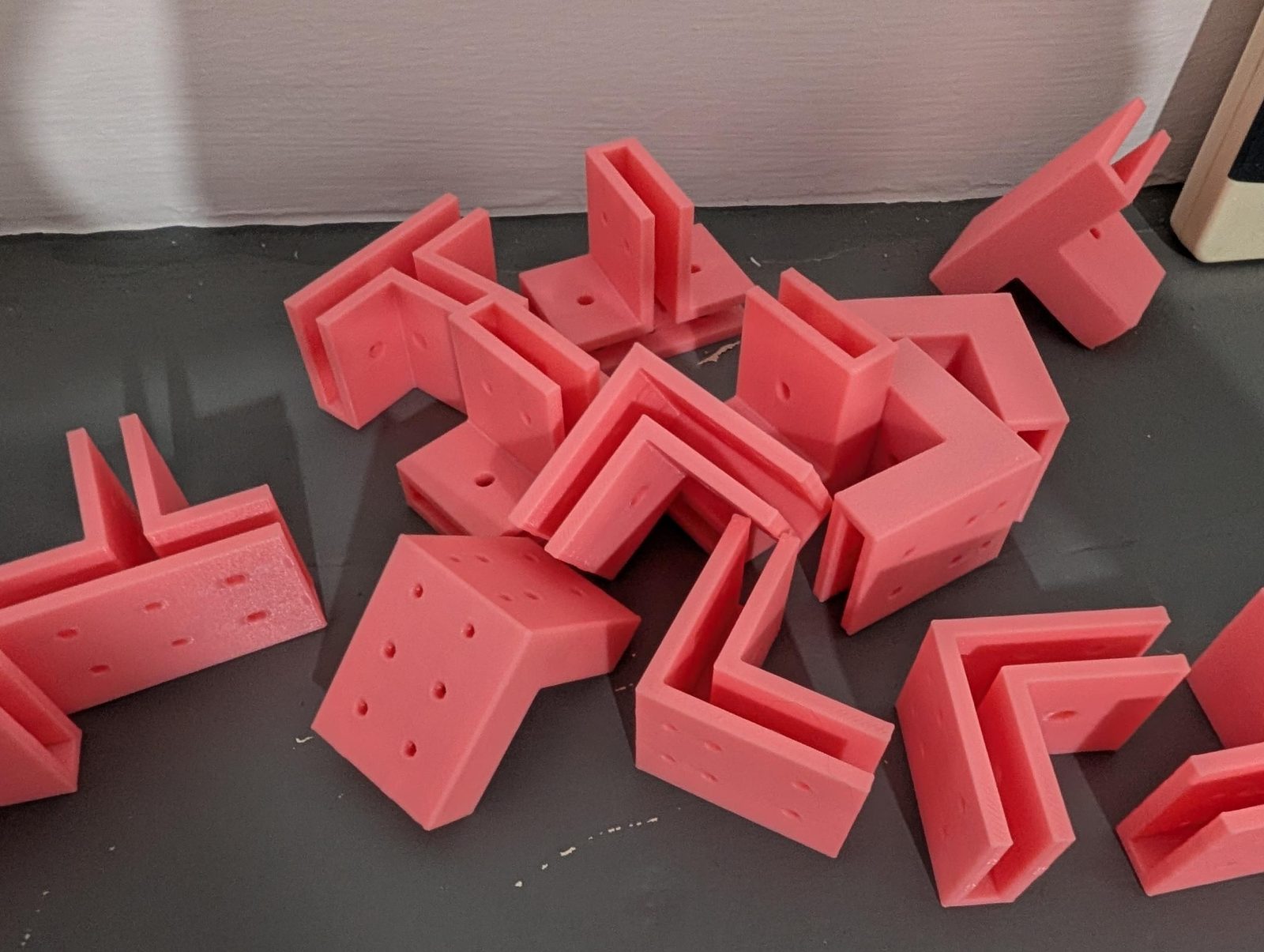 A pile of printed T-joints and L-corners.